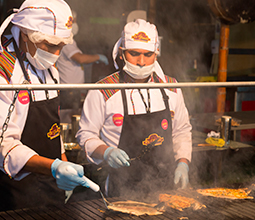 Chef preparing typical Peruvian dishes